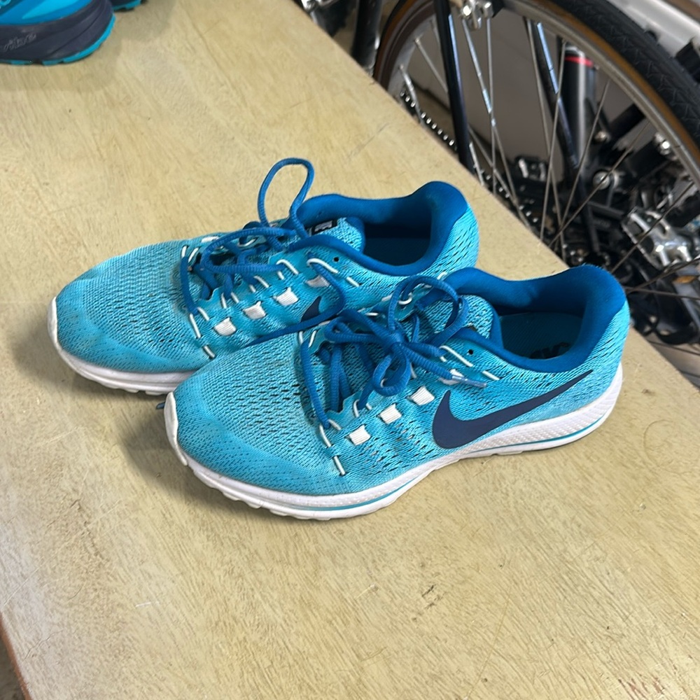 Blue Nike zoom running shoes